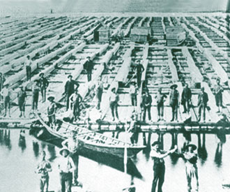 Photograph of square timber raft and pointer boat